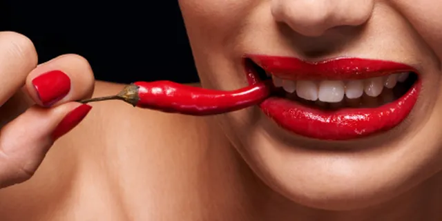 woman eating a chili